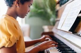 musical-education-happy-black-girl_bwc92601711.jpg
